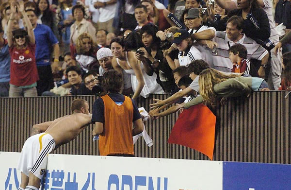 Two David Beckham fans, aged 9 and 10, are suing each other over a shirt that the football star handed to the crowd after a LA Galaxy game agains Japan's Gamba Osaka at Hawaii's Aloha Stadium.