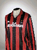A RED AND BLACK A.C. MILAN SHIRT 