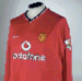 A RED MANCHESTER UNITED SHIRT 