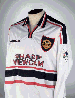 A WHITE MANCHESTER UNITED SHIRT 