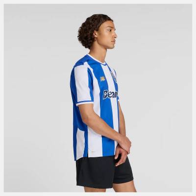 fc_porto_25_26_new_balance_home_kit_2.jpg
