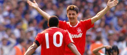 Ian Rush celebrates another FA Cup Final goal with John Barnes.