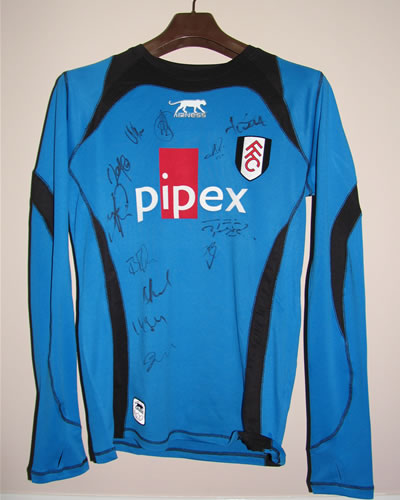 Rare Fulham shirt accordingly never worn by the team with 12 players autographs.