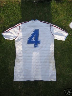 On the rear of the shirt is the number 4 again with the adidas logo on the bottom of the shirt again these were not available on replica shirts at this time