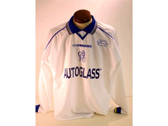 186. Shirt: A white with blue & yellow trim Chelsea Shirt with embroidered badge and “UEFA Cup Winners Cup Winners 1998” to front and No. 24 Newton to rear. £120-150