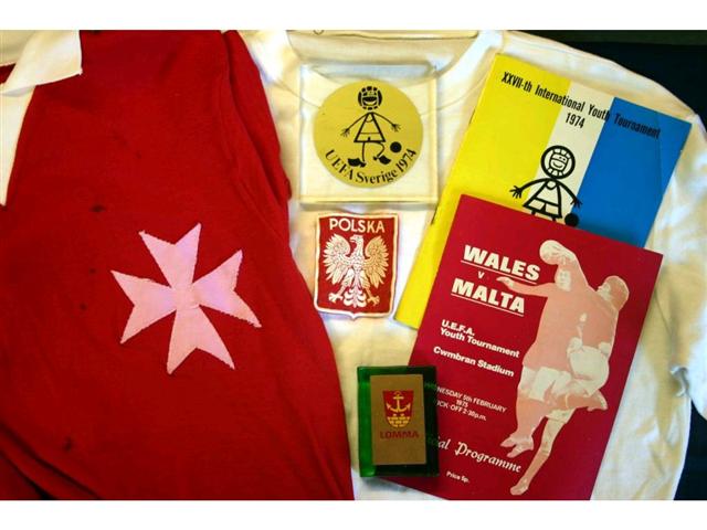 322. International Shirts Etc: A white crew neck long-sleeve shirt with Poland badge to front, No. 8 to rear plus itinerary & exchange gifts etc. also a red with white trim shirt with Maltese crest to front, No. 6 to rear plus programme. £120-150