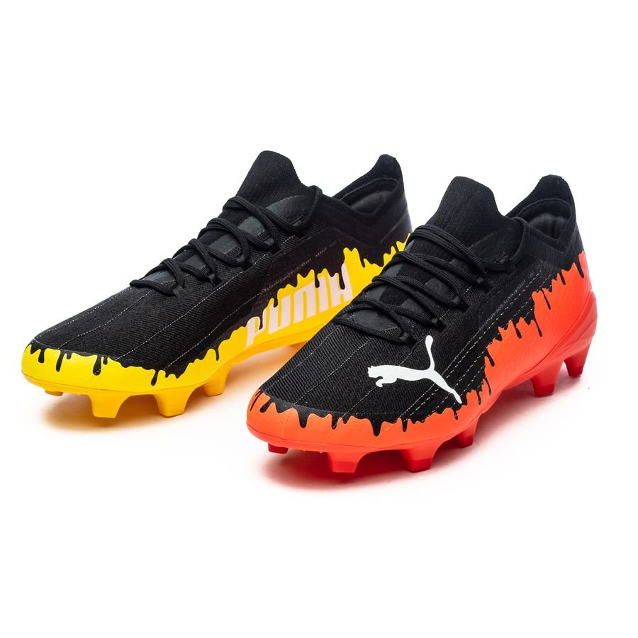 black and red puma football boots
